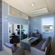 Outdoor living can be enjoyed most of the architecture, ceiling, daylighting, floor, home, house, interior design, living room, real estate, room, window, gray, white