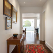 This hallway was widened in a major villa ceiling, floor, flooring, hardwood, home, interior design, living room, real estate, room, window, wood flooring, gray