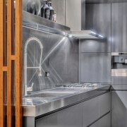 The wooden dividing wall in this loft kitchen architecture, countertop, interior design, kitchen, gray