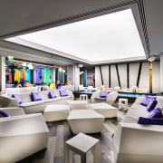 Central bar area of Matisse Beach Club by interior design, product design, white, gray