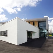 The Beattie Centre within the St Cuthberts Centennial architecture, building, commercial building, corporate headquarters, facade, home, house, property, real estate, residential area, white, gray