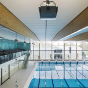 The 34m-long laminated beams over the main pool apartment, architecture, ceiling, condominium, daylighting, estate, leisure, leisure centre, real estate, roof, structure, swimming pool, gray