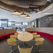 :This central pod is one of two collaboration architecture, auditorium, ceiling, conference hall, interior design, office, gray