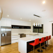 Reno4u has a solution to every tricky kitchen ceiling, countertop, floor, flooring, furniture, hardwood, interior design, kitchen, laminate flooring, real estate, room, table, wood, wood flooring, white, orange