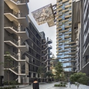 Public walkways on the retail podium at One apartment, architecture, building, city, condominium, facade, metropolis, metropolitan area, mixed use, neighbourhood, real estate, residential area, skyscraper, tower block, urban area, urban design, window, gray, black