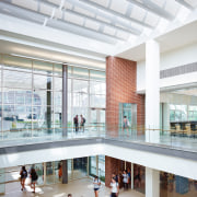 This lobby and the common room share the architecture, building, daylighting, interior design, lobby, mixed use, shopping mall, tourist attraction, white, gray