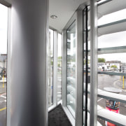 A slight kink in this new building allows interior design, structure, window, gray, white