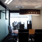Office interiors in the new building at 76-78 ceiling, interior design, office, gray, black