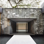 This entry to a room on the lower architecture, facade, home, house, interior design, lobby, wall, black, white, gray