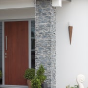The entry to this new GJ Gardner Homes architecture, facade, home, house, siding, structure, window, gray, white