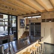 This new semi-industrial kitchen features a birch timber architecture, ceiling, countertop, house, interior design, kitchen, real estate, orange, brown