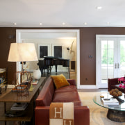 The library in this remodeled '60s house teams ceiling, home, house, interior design, living room, real estate, room, window, white, brown