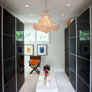 Sleek, black Ikea doors enliven this closet and architecture, ceiling, home, house, interior design, kitchen, living room, room, table, gray, black