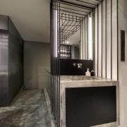 Steel framework appears to support this floating vanity architecture, ceiling, floor, flooring, interior design, gray, black