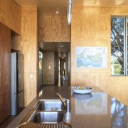 Radiata pine ply clads the walls throughout the architecture, cabinetry, ceiling, countertop, estate, home, interior design, real estate, room, wood, brown, orange