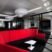 Both red and green furnishings appear in the architecture, ceiling, interior design, lobby, black, gray