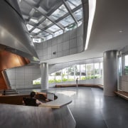 Aluminium panels clad the central pod in the architecture, ceiling, daylighting, house, interior design, lobby, loft, gray, black