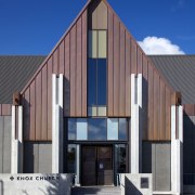 Pre-weathered copper clads the gables of Knox Church architecture, building, commercial building, corporate headquarters, elevation, facade, house, real estate, residential area, gray, blue