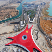 The Ferrari Theme Park features Euramax colour-coated aluminium aerial photography, bird's eye view, city, fixed link, sky, urban area, water, gray