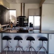 Before image of a  U-shaped kitchen that countertop, interior design, kitchen, real estate, gray