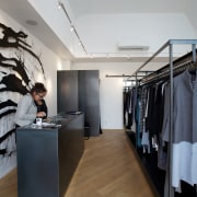 Taylor, a store on the corner of a boutique, fashion, interior design, product design, gray, black