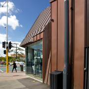 This new retail building in a high-end Christchurch architecture, building, city, commercial building, facade, house, neighbourhood, real estate, residential area, sky, gray