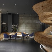 The centrepiece of Raw restaurant in Taipei is architecture, ceiling, floor, furniture, interior design, lobby, wood, black, brown