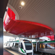 This curved red canopy in the new Butler architecture, metropolitan area, public transport, red, train, train station, transport, black