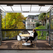 Steel doors open up to the Gaze office architecture, balcony, courtyard, door, house, outdoor structure, real estate, window, black, gray