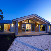 The new Lockwood show home in Christchurch features architecture, cottage, elevation, estate, facade, home, house, lighting, property, real estate, residential area, roof, siding, sky, window, blue