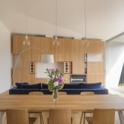 A 12m-long opening off the living area in architecture, ceiling, daylighting, home, house, interior design, real estate, room, table, wood, gray