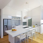 This kitchen, designed and manufactured by Mastercraft Kitchens architecture, ceiling, countertop, floor, interior design, kitchen, room, table, gray