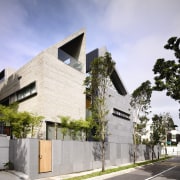 The two wings of this large family home apartment, architecture, building, condominium, facade, home, house, mixed use, neighbourhood, property, real estate, residential area, blue