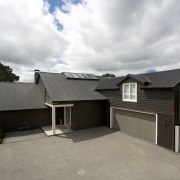 Popular on all styles of homes, Colorsteel is architecture, cottage, facade, home, house, property, real estate, residential area, roof, siding, suburb, gray, white