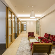 CAAHT Studio Architects works well in a variety ceiling, interior design, living room, lobby, real estate, room, brown, orange, gray