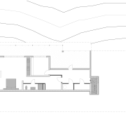 The basement of this home includes a self-contained angle, architecture, area, black and white, design, diagram, drawing, elevation, floor plan, font, house, line, plan, product, product design, rectangle, square, structure, text, white