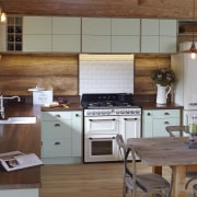 The cabinetry in this log cabin has been cabinetry, countertop, cuisine classique, interior design, kitchen, room, brown, gray