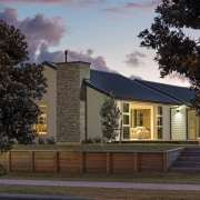 On this GJ Gardner home, James Hardie weatherboard architecture, building, cottage, estate, evening, facade, farmhouse, home, house, property, real estate, residential area, roof, siding, sky, suburb, tree, black