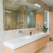 The long mirror in this bathroom has a bathroom, interior design, room, sink, tap, gray