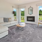 The separate lounge in Landmark Homes show home estate, floor, flooring, hardwood, home, interior design, laminate flooring, living room, property, real estate, room, window, wood flooring, gray