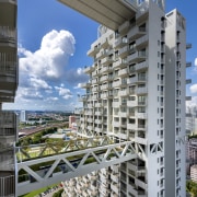 Sky Habitats two towers are positioned as far apartment, architecture, building, city, commercial building, condominium, corporate headquarters, daytime, facade, landmark, metropolis, metropolitan area, mixed use, real estate, residential area, sky, skyscraper, structure, tower block, urban area, gray