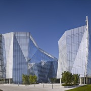 Like a smooth gem cracked open to reveal architecture, building, commercial building, corporate headquarters, daytime, headquarters, landmark, metropolis, metropolitan area, mixed use, sky, skyscraper, tower block, blue, gray