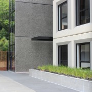 For Aucklands new student village, the custom concrete architecture, building, condominium, estate, facade, home, house, property, real estate, residential area, wall, window, gray