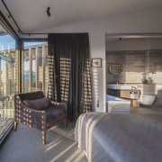 Silk-linen drapes and a velvet chair bring balance architecture, estate, interior design, property, real estate, room, window, gray