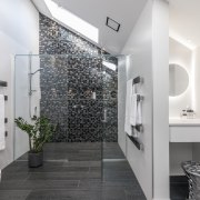 Multiple light sources and twinkling mosaics give this architecture, bathroom, floor, home, interior design, product design, room, tile, white, gray