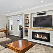 A hassle-free built-in feature gas fire adds ambience fireplace, hearth, interior design, living room, property, real estate, room, gray