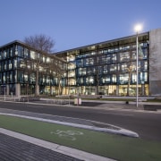 The ECAN buildings sun louvres and blue and apartment, architecture, building, city, commercial building, condominium, corporate headquarters, facade, headquarters, house, metropolitan area, mixed use, neighbourhood, property, real estate, residential area, sky, black, teal, gray