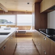 Wood tones predominate in this kitchen, part of cabinetry, countertop, cuisine classique, floor, flooring, hardwood, interior design, kitchen, real estate, room, wood, wood flooring, gray, brown