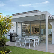 The Bask Outdoor Living Systems louvred roof and house, outdoor structure, patio, real estate, roof, gray