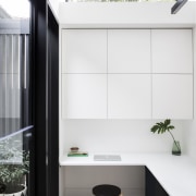 This study space looks out onto a small architecture, furniture, house, interior design, product design, white